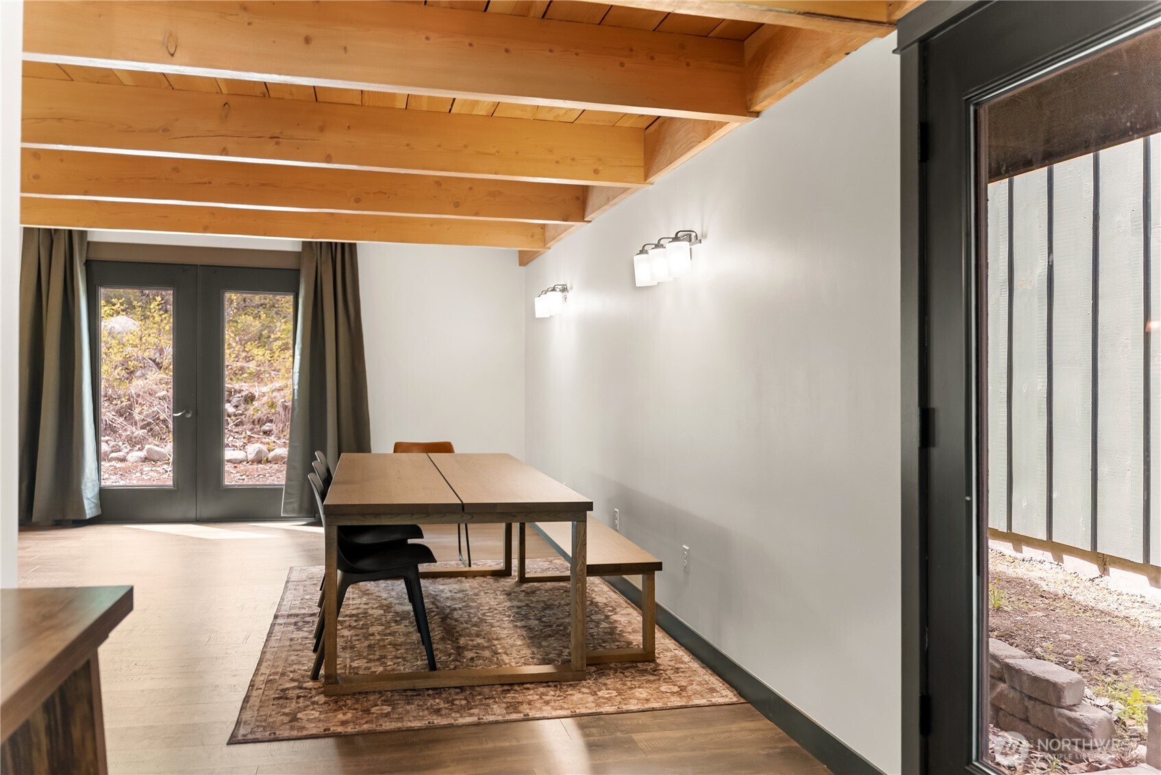 211 West Buttermilk Creek Road Twisp, WA 98856 - Photo 18 of 40 a view of a hallway with furniture and front door