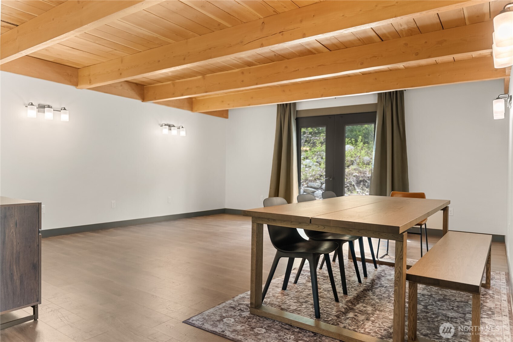 211 West Buttermilk Creek Road Twisp, WA 98856 - Photo 19 of 40 a view of a dining room with furniture and window