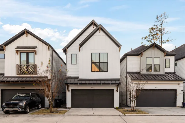 a view of front door and a yard