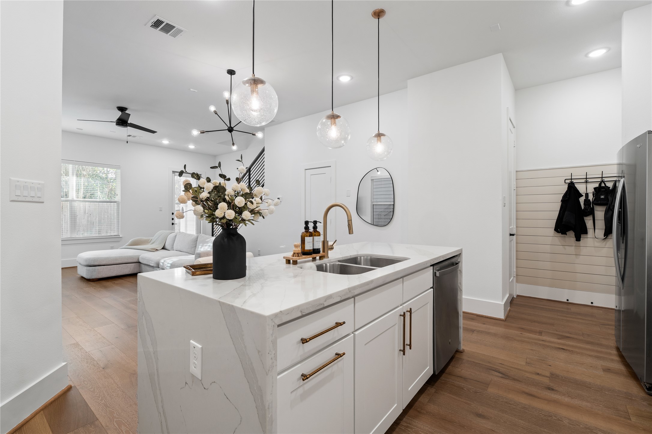 9011 Wellspring Drive Houston, TX 77080 - Photo 12 of 24 a kitchen that has a lot of cabinets and wooden floor