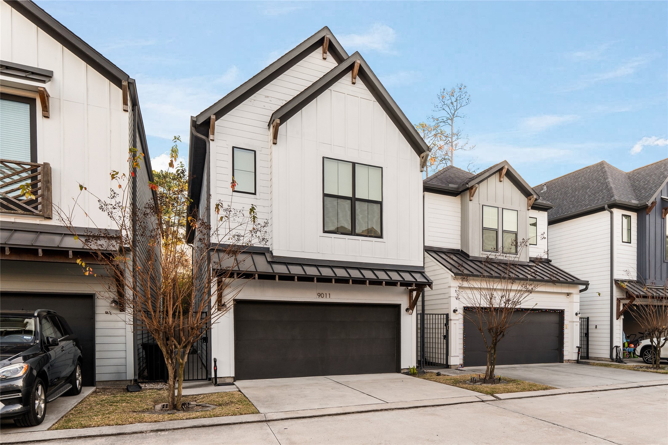 9011 Wellspring Drive Houston, TX 77080 - Photo 2 of 24 a front view of a house with a garage