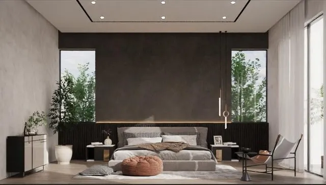 a living room with furniture and a potted plant