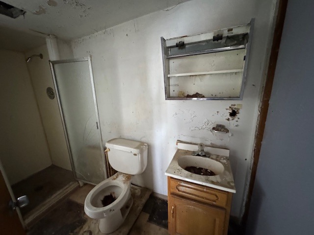 3053 North Kenneth Avenue Chicago, IL 60641 - Photo 10 of 10 a bathroom with a toilet and a sink