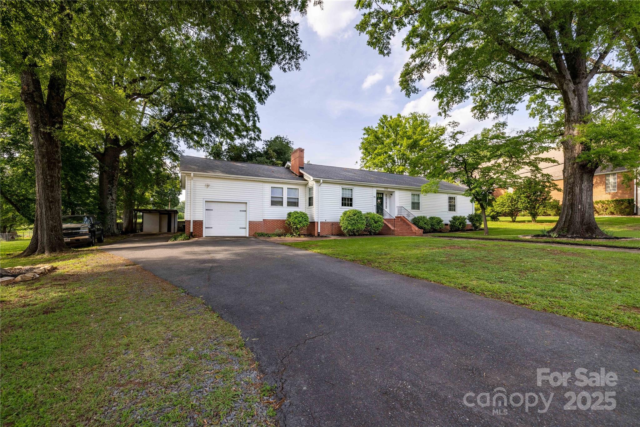 80 Pine Street Badin, NC 28009 - Photo 2 of 42 a view of a house with a yard