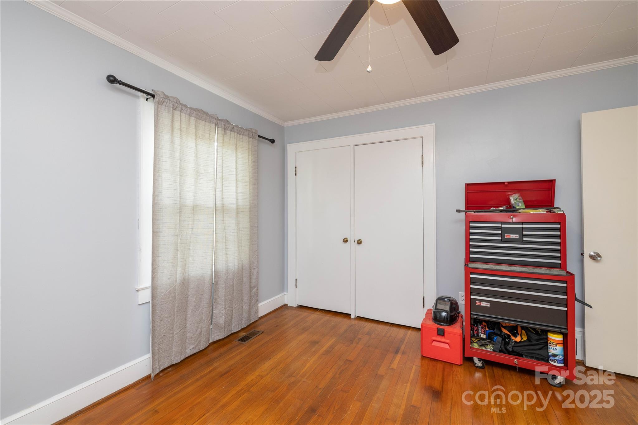 80 Pine Street Badin, NC 28009 - Photo 21 of 42 a view of room with entryway wooden floor and windows