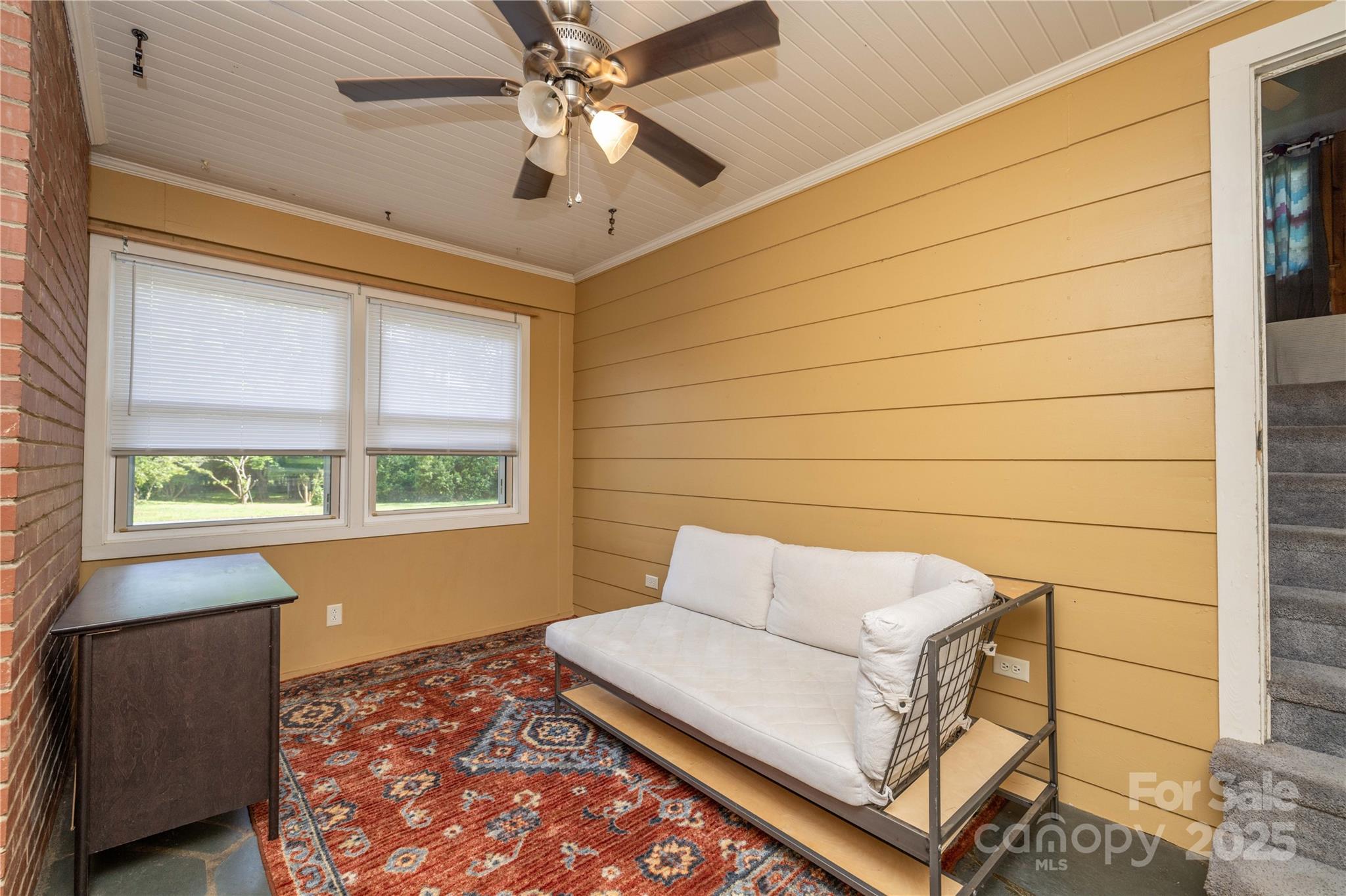 80 Pine Street Badin, NC 28009 - Photo 24 of 42 a bedroom with a bed and a window