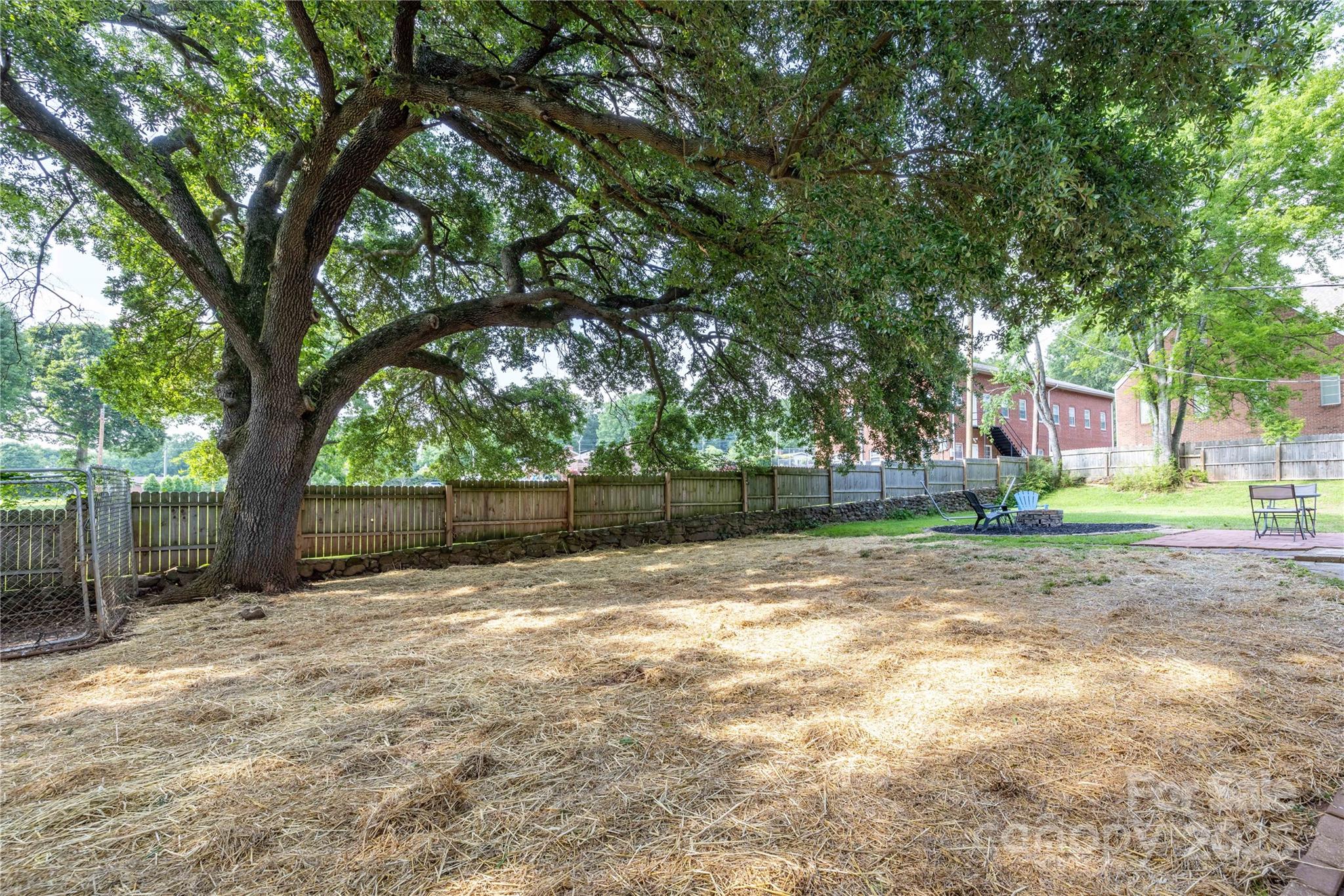 80 Pine Street Badin, NC 28009 - Photo 5 of 42 a view of backyard with green space