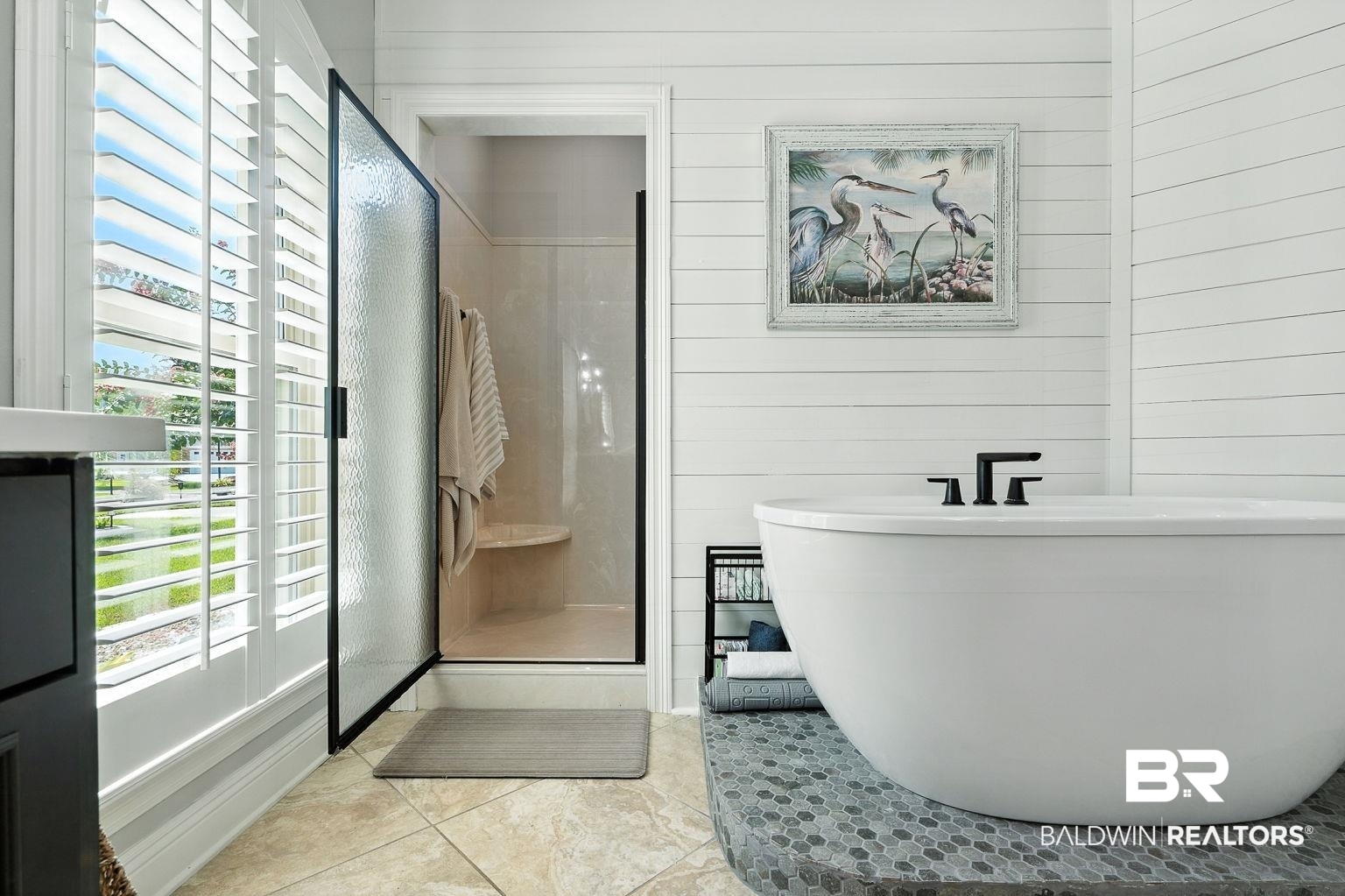 23357 Carnoustie Drive Foley, AL 36535 - Photo 61 of 99 Full bathroom with a freestanding bath, a shower stall, tile patterned floors, and wood walls