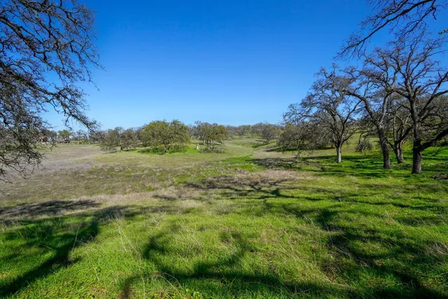 a view of lake with mountain in the background