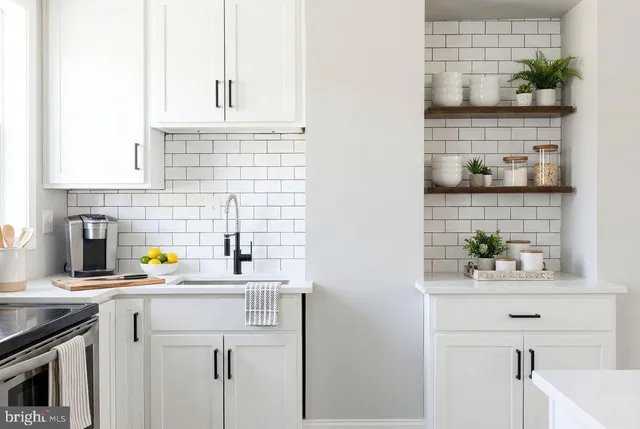 a kitchen with a sink and a cabinets