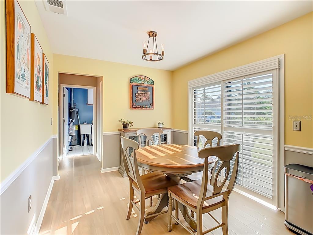 2901 Plantation Road Winter Haven, FL 33884 - Photo 13 of 30 a view of a dining room with furniture and window