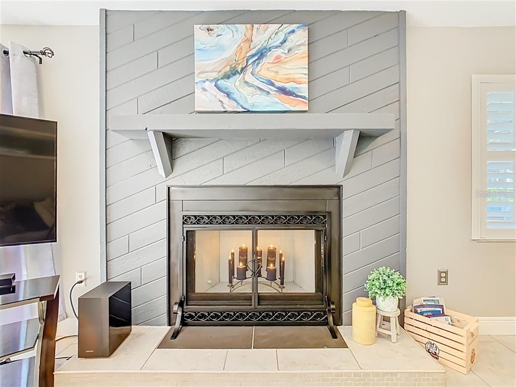 2901 Plantation Road Winter Haven, FL 33884 - Photo 17 of 30 a living room with a fireplace