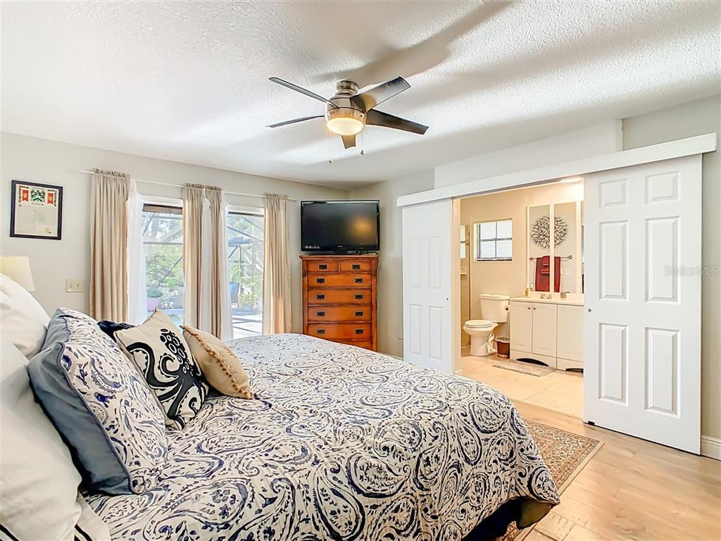 2901 Plantation Road Winter Haven, FL 33884 - Photo 18 of 30 a bedroom with a large bed and a window