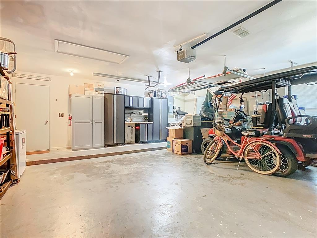 2901 Plantation Road Winter Haven, FL 33884 - Photo 26 of 30 a view of a garage with a bike and car