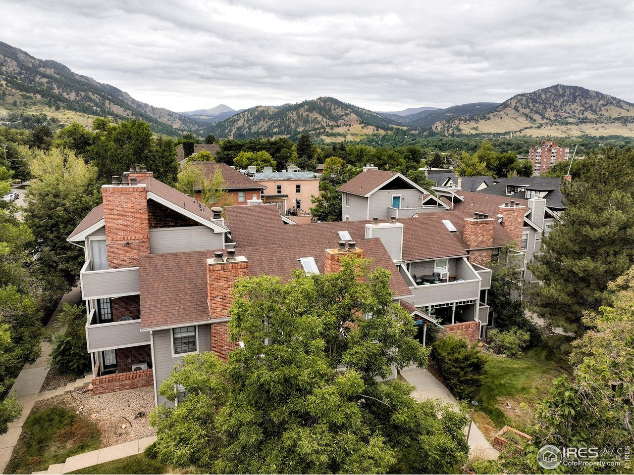 1405 Broadway, Unit 101 Boulder, CO 80302 - Photo 18 of 22 a view of a city with a building in the background