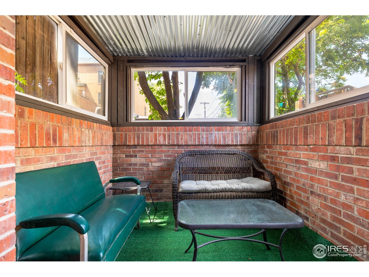 1405 Broadway, Unit 101 Boulder, CO 80302 - Photo 7 of 22 a view of outdoor space deck and outdoor seating