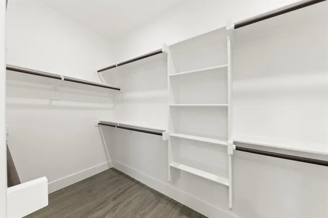 a view of an empty walk in closet