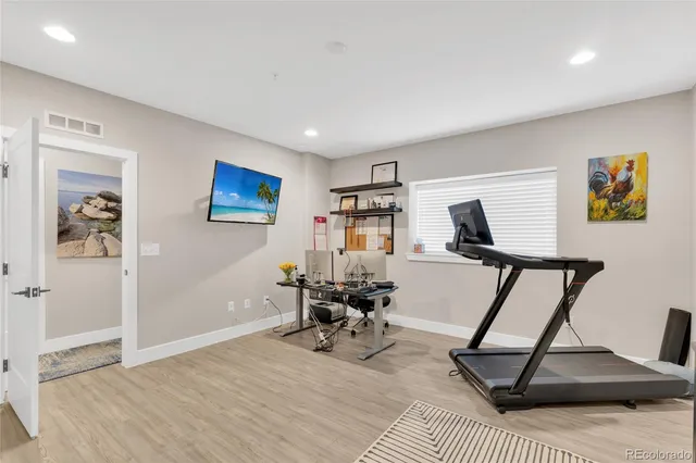 a view of a room with gym equipment