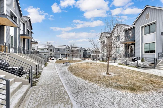 a view of a pathway with a house