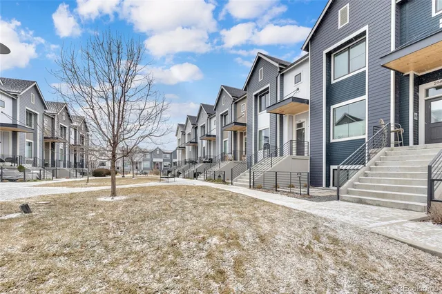 a view of a building with a snow in front of it