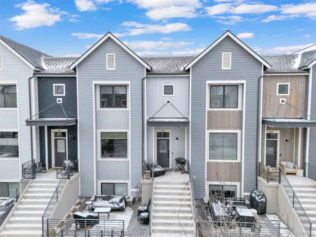 a front view of a house with glass windows