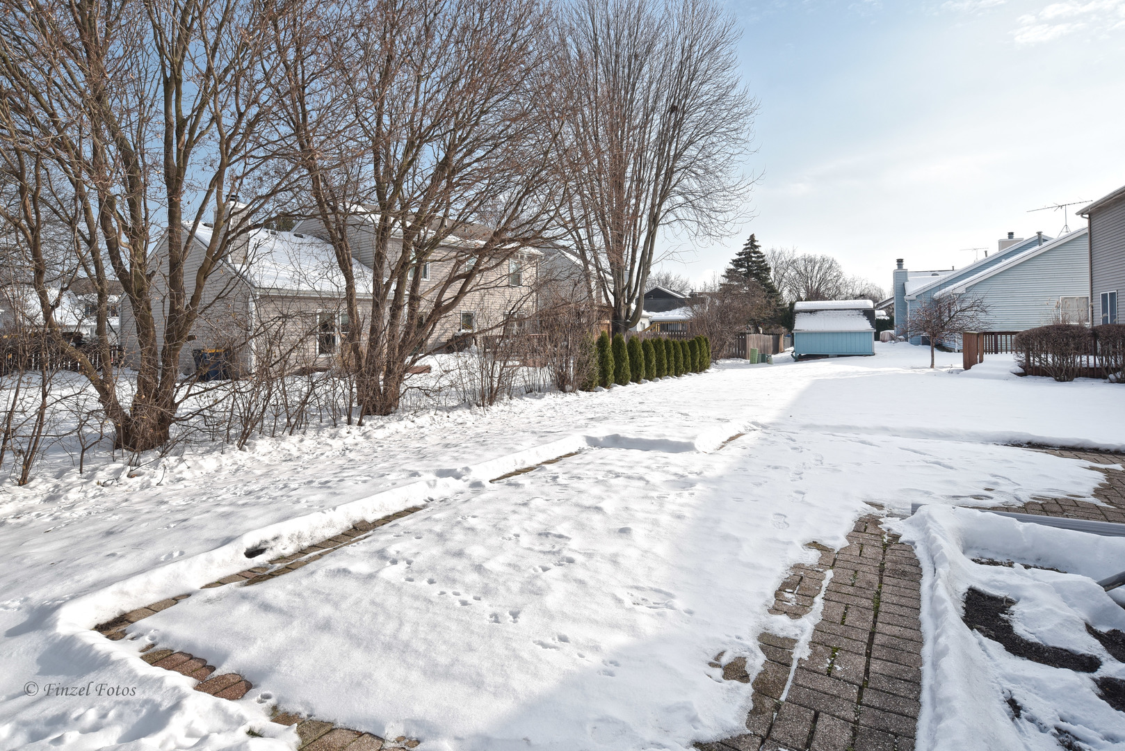 691 Canyon Lane Elgin, IL 60123 - Photo 16 of 17 a street view covered with snow