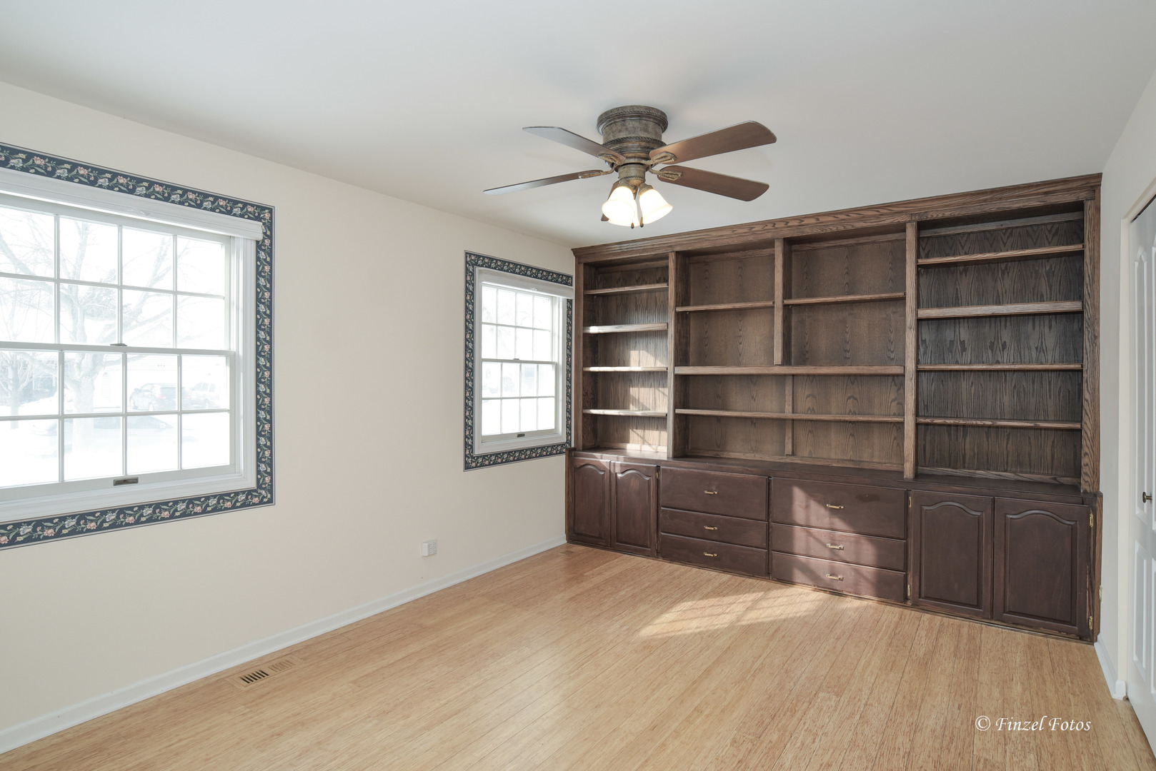 691 Canyon Lane Elgin, IL 60123 - Photo 8 of 17 a bedroom with a bed and a window