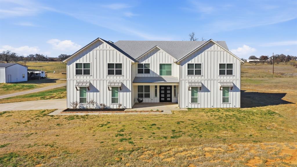 4600 Old Brock Road Weatherford, TX 76087 - Photo 3 of 37 Contemporary farmhouse exterior with white board-and-batten siding