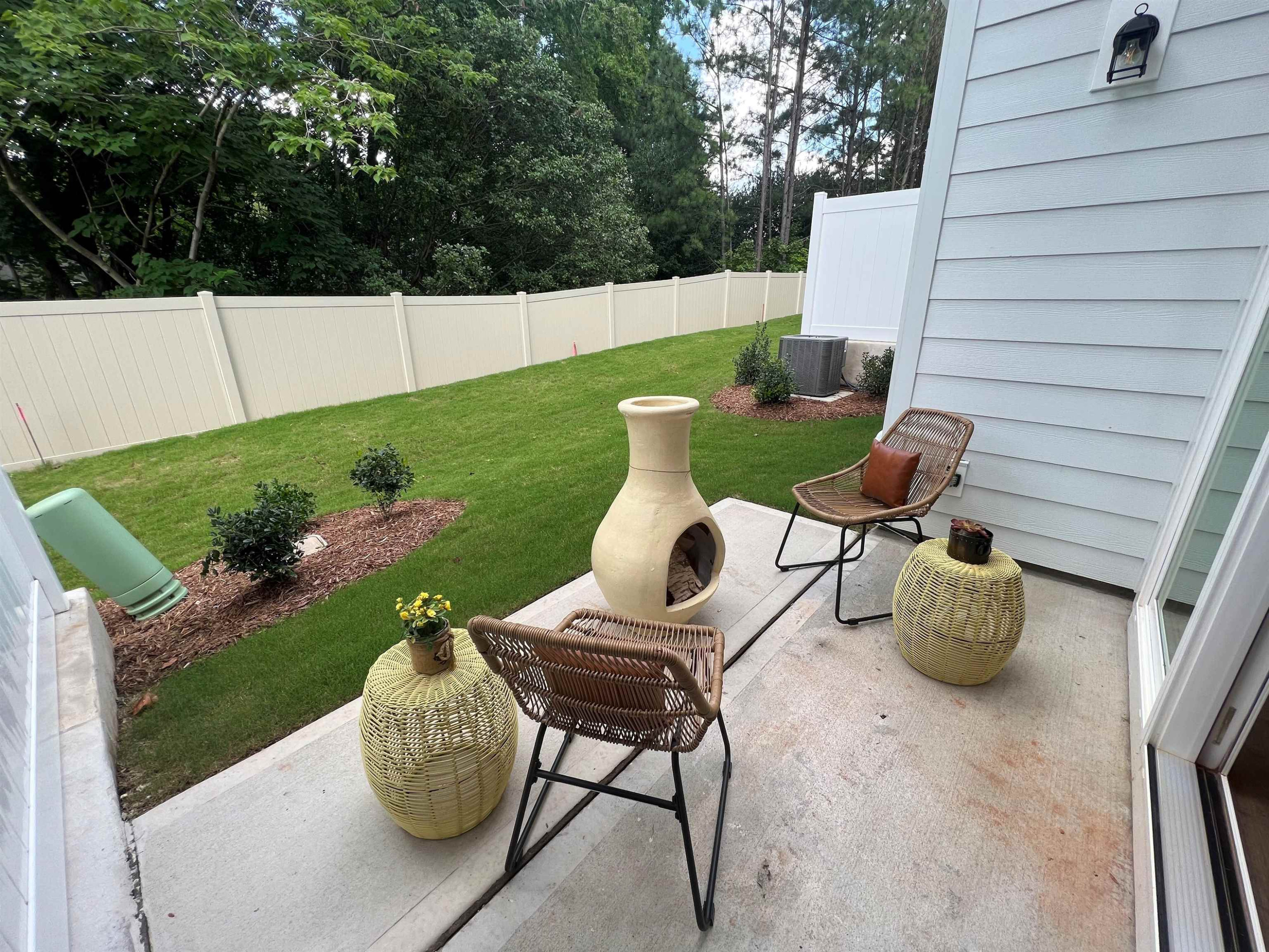 7908 Sofiana Avenue Raleigh, NC 27617 - Photo 14 of 26 a view of backyard with seating space