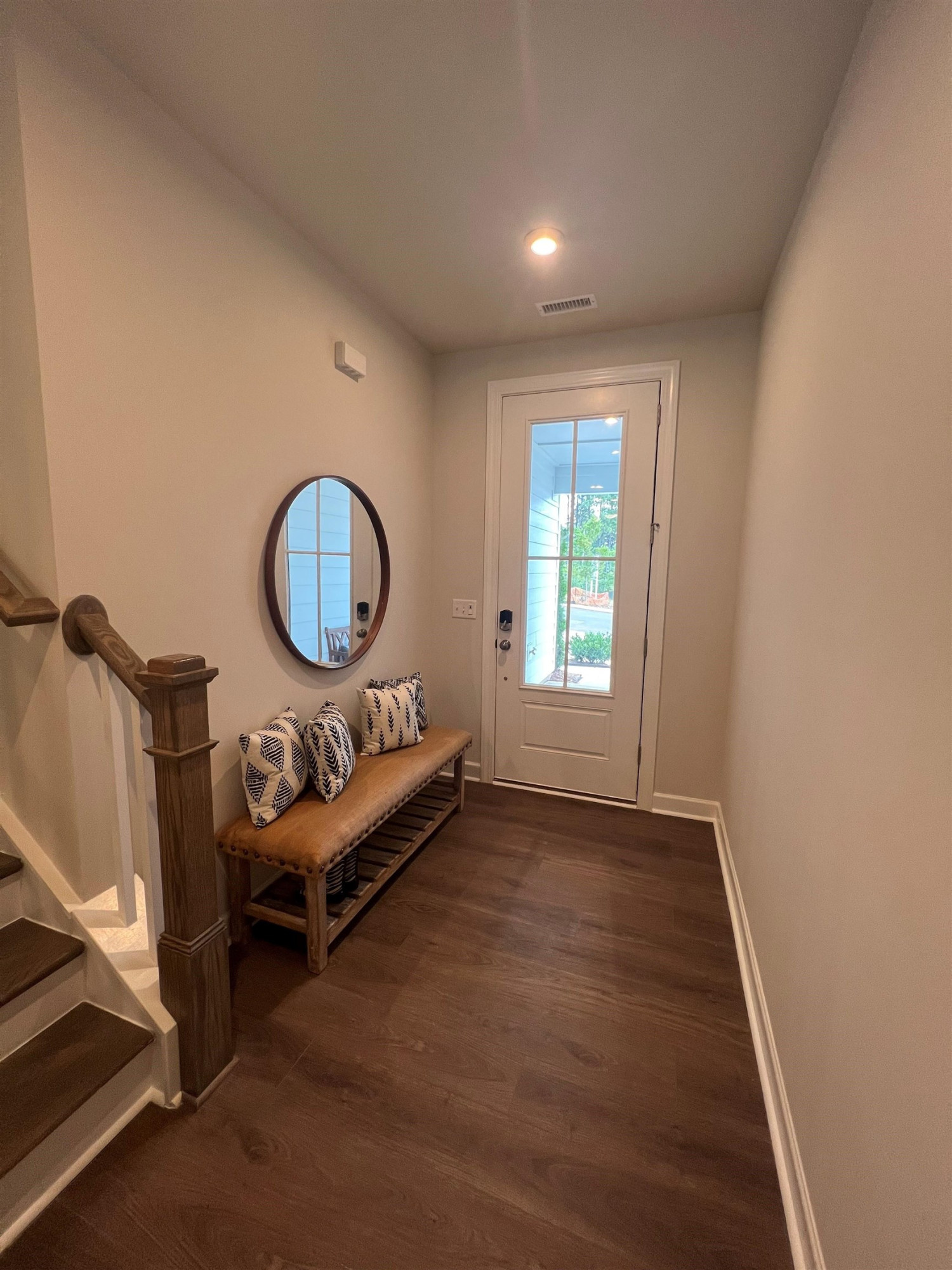 7908 Sofiana Avenue Raleigh, NC 27617 - Photo 4 of 26 a view of a room with furniture and a window