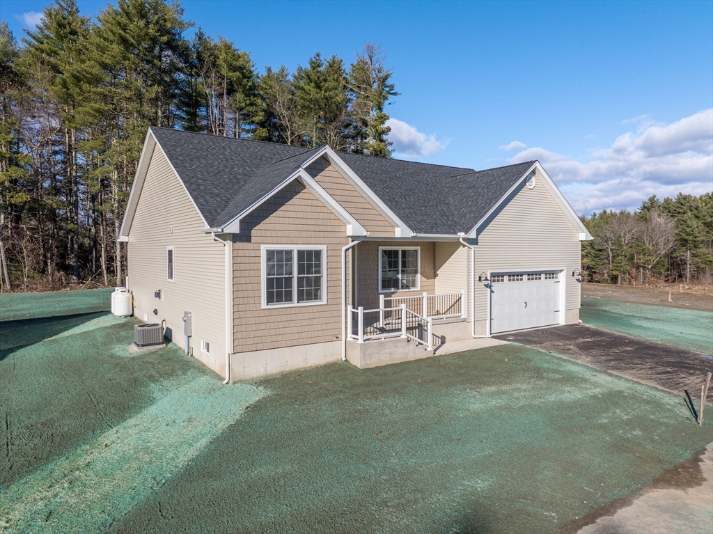 31 High Blf Road Belchertown, MA 01007 - Photo 1 of 36 a view of house with a yard and sitting area