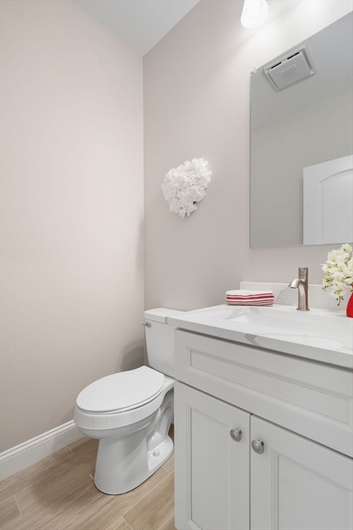 31 High Blf Road Belchertown, MA 01007 - Photo 15 of 36 a bathroom with a toilet sink and mirror