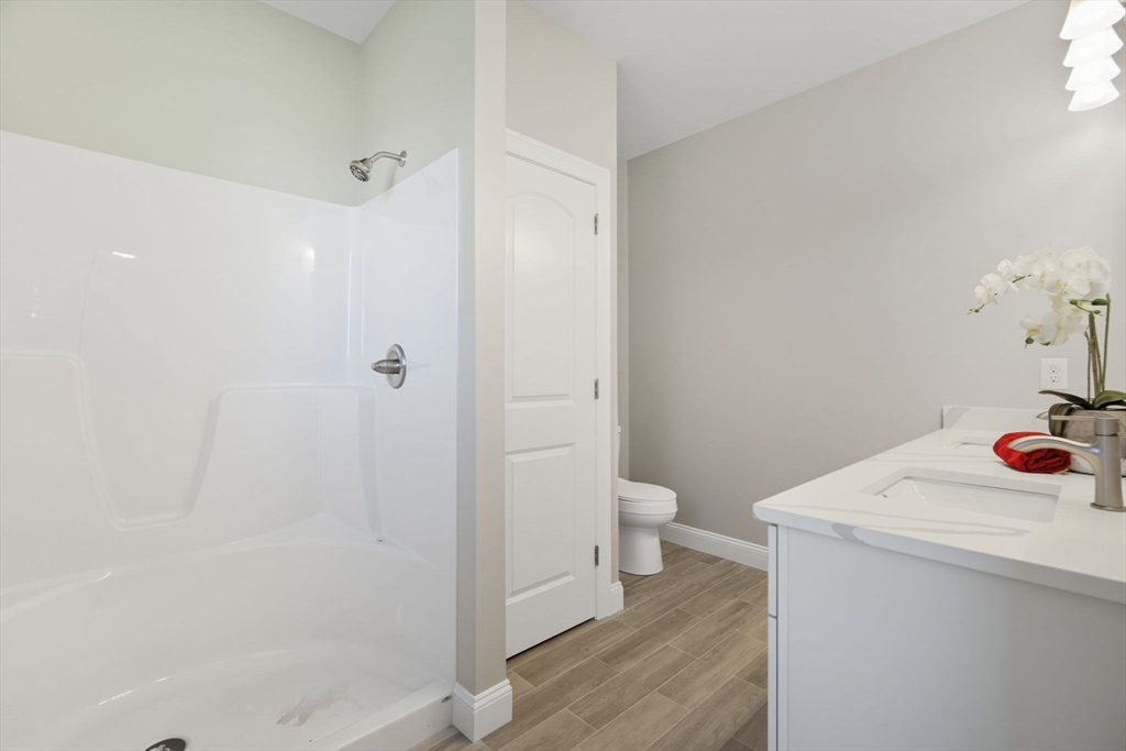 31 High Blf Road Belchertown, MA 01007 - Photo 28 of 36 a bathroom with a sink toilet and shower