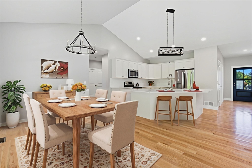 31 High Blf Road Belchertown, MA 01007 - Photo 10 of 36 a view of a dining room with furniture and wooden floor