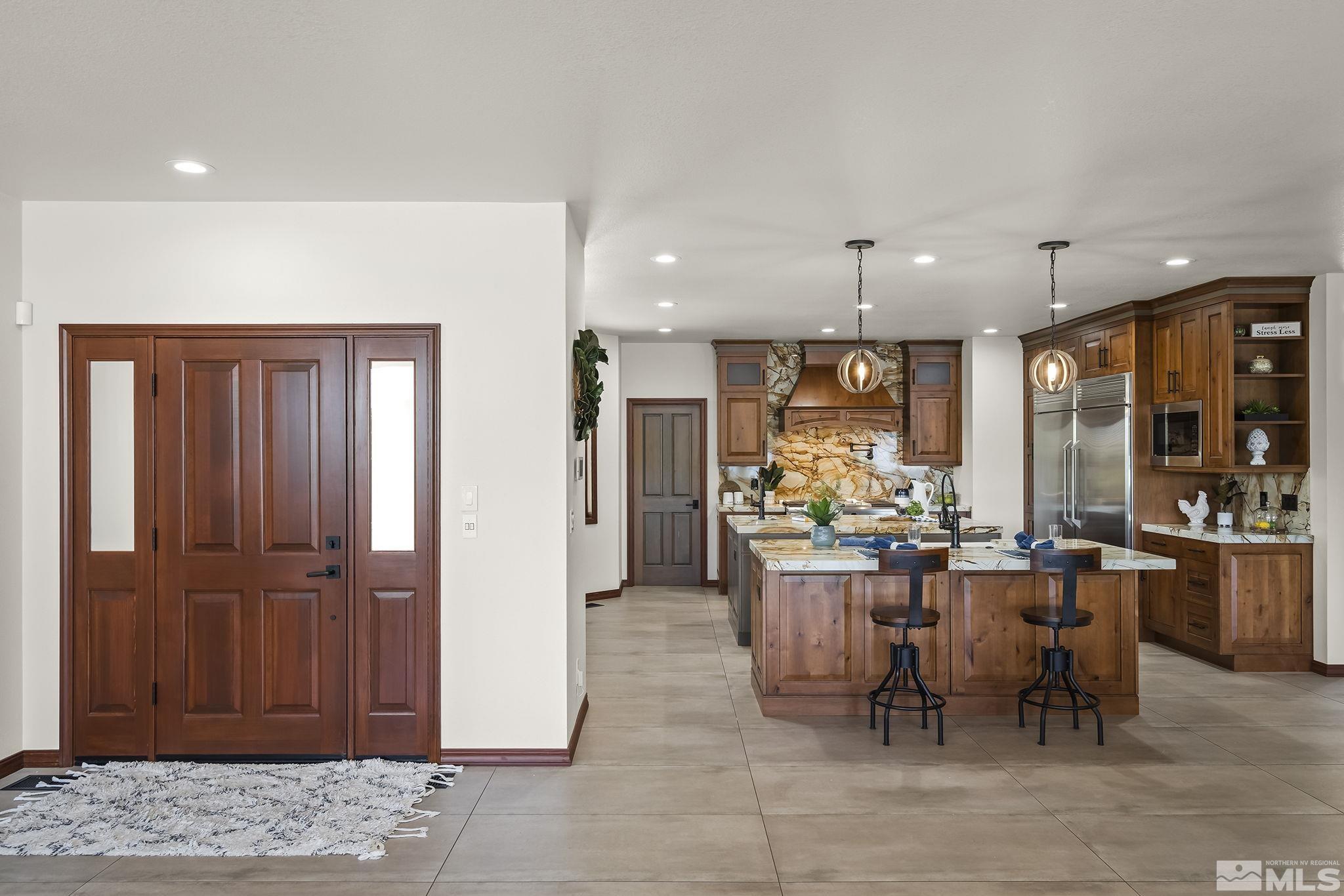 2800 East Lake Ridge Reno, NV 89519 - Photo 15 of 40 a view of a dining area with furniture window and outside view