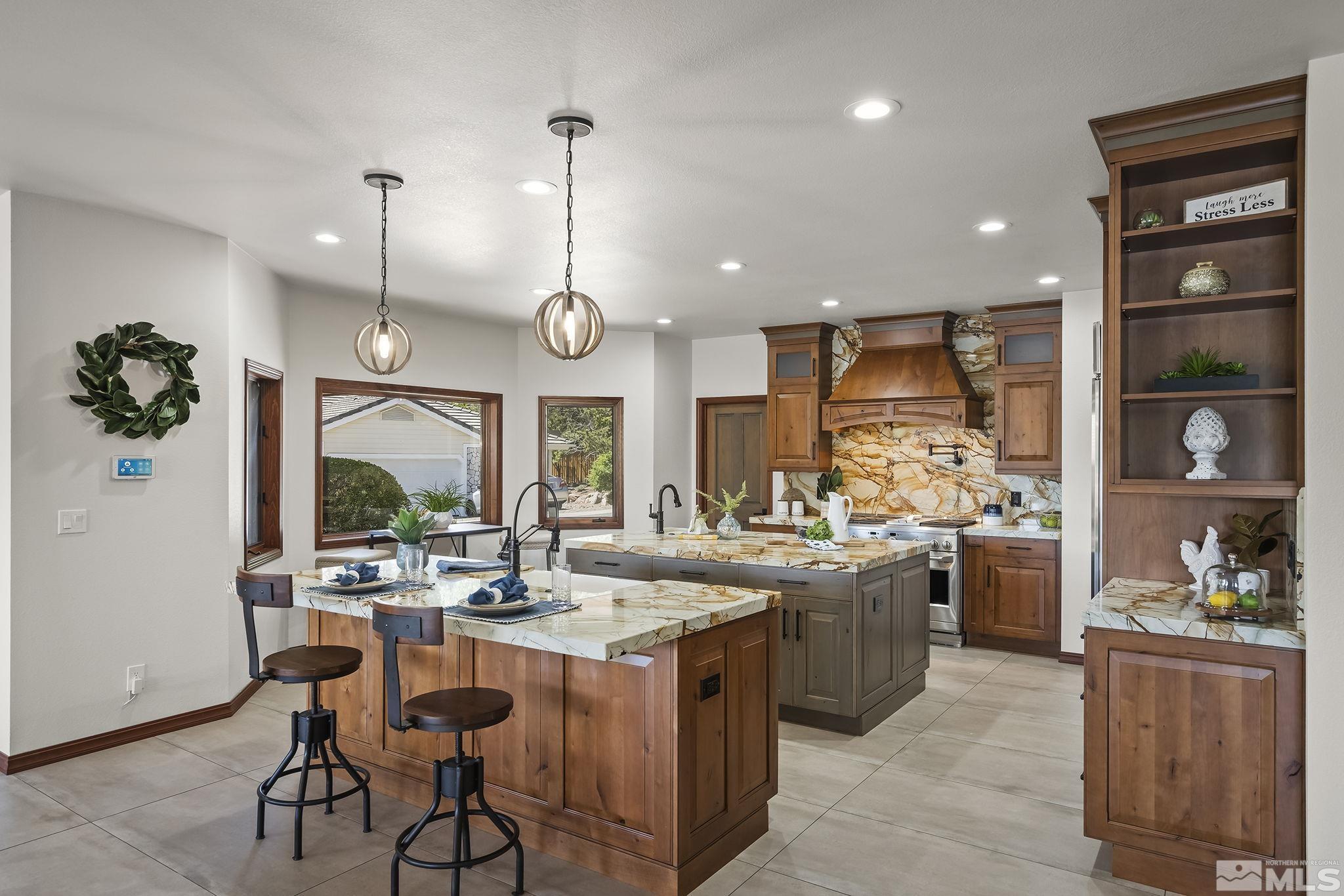 2800 East Lake Ridge Reno, NV 89519 - Photo 16 of 40 a kitchen with lots of counter top space and appliances