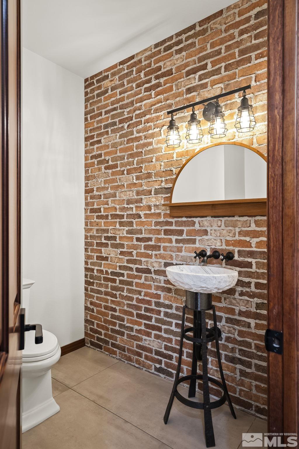 2800 East Lake Ridge Reno, NV 89519 - Photo 20 of 40 a bathroom with a sink and a mirror