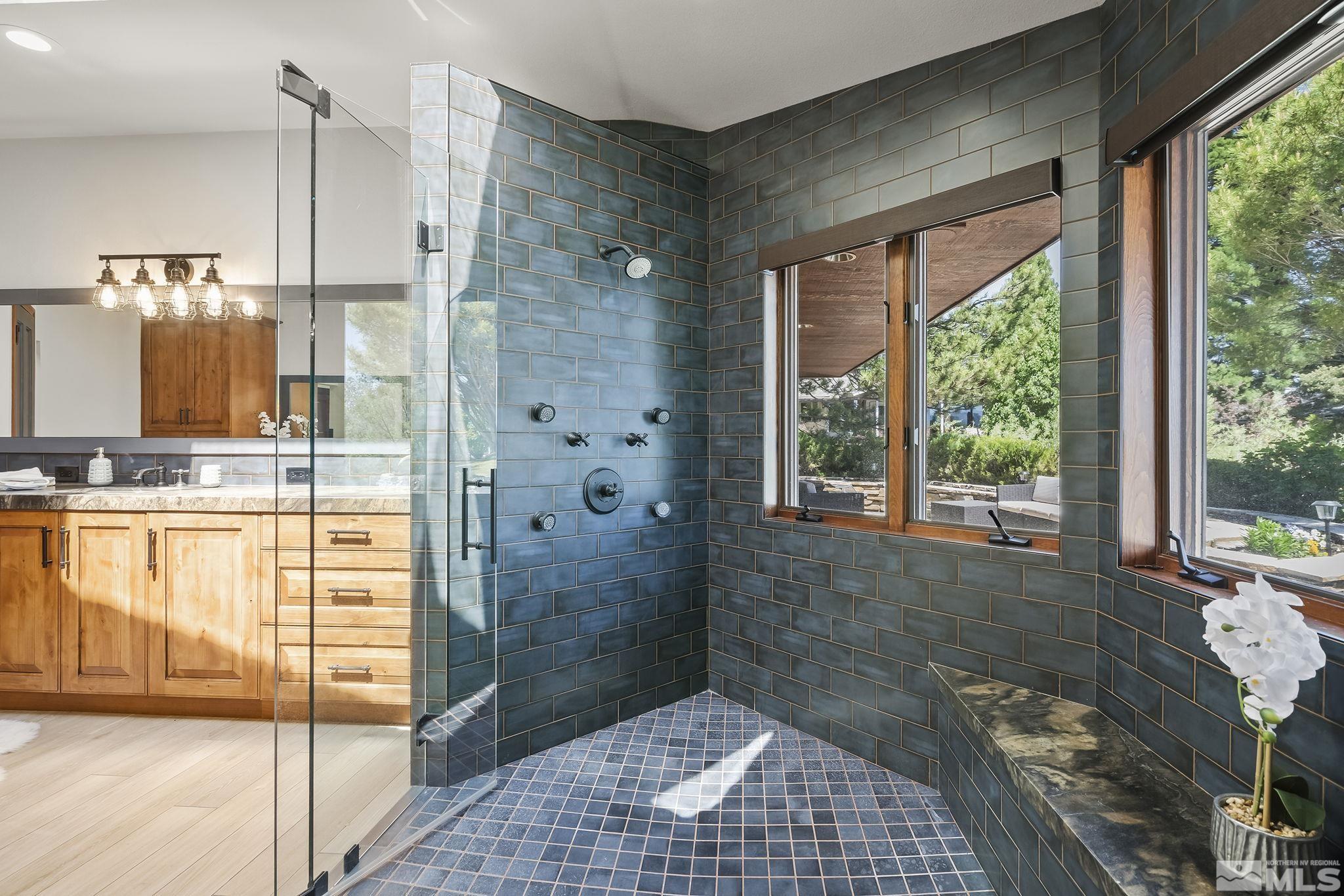 2800 East Lake Ridge Reno, NV 89519 - Photo 25 of 40 a bathroom with a tub shower and sink