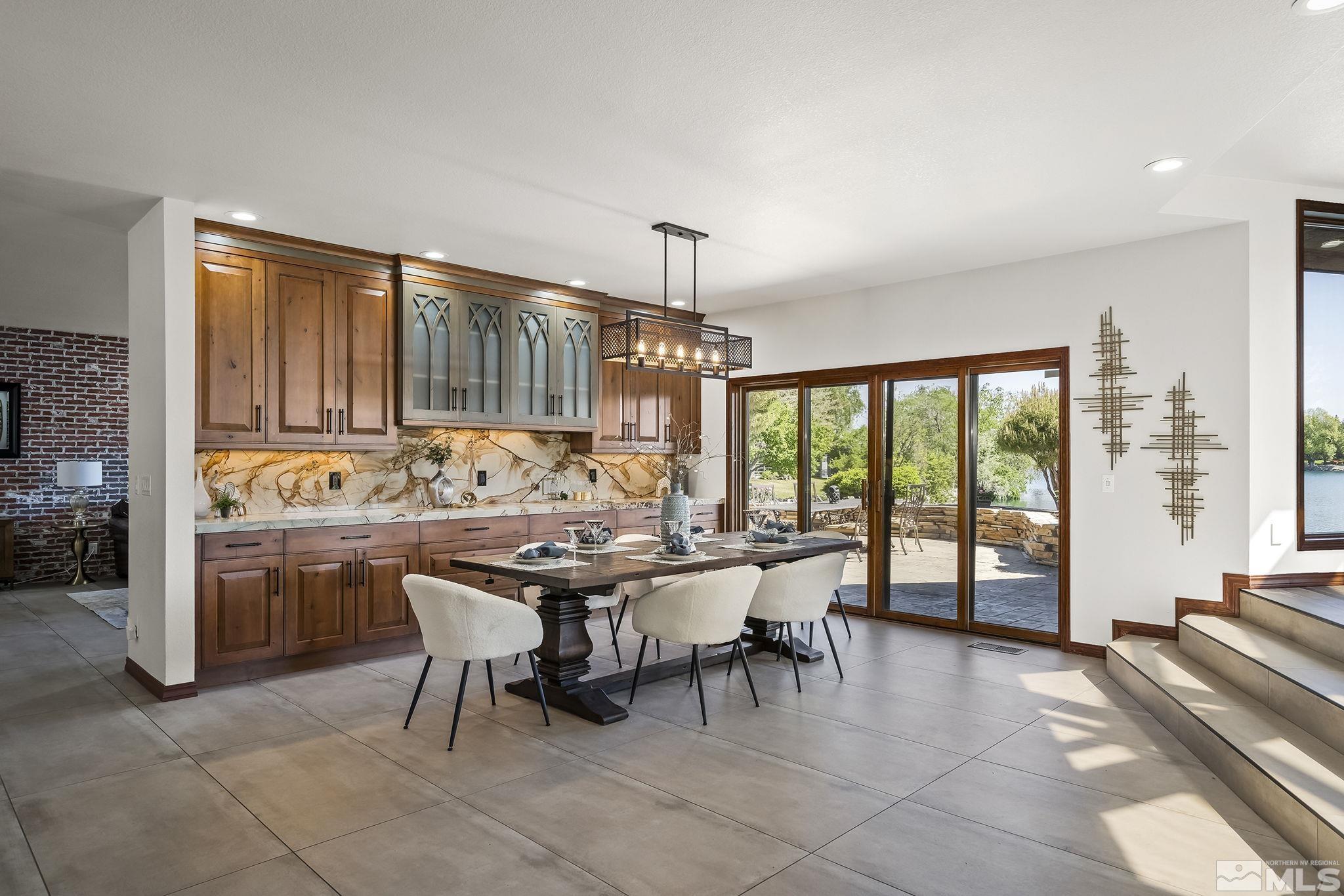 2800 East Lake Ridge Reno, NV 89519 - Photo 5 of 40 a view of a dining room with furniture window and outside view