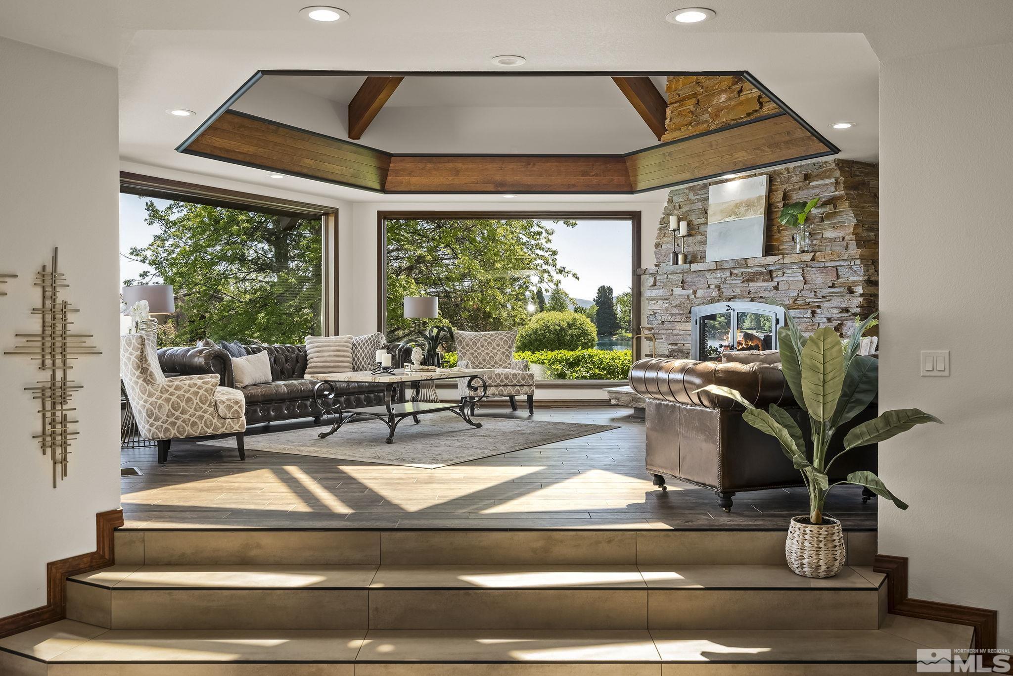 2800 East Lake Ridge Reno, NV 89519 - Photo 8 of 40 a living room with patio furniture and a potted plant