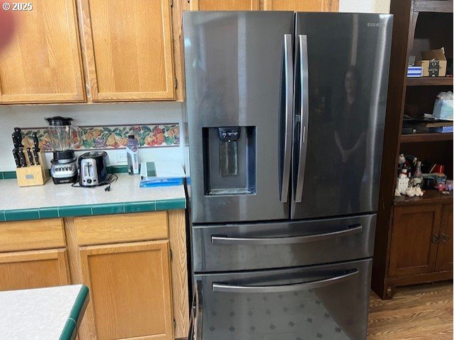 33399 Northwest Ej Smith Road Scappoose, OR 97056 - Photo 4 of 16 a kitchen with refrigerator and cabinets