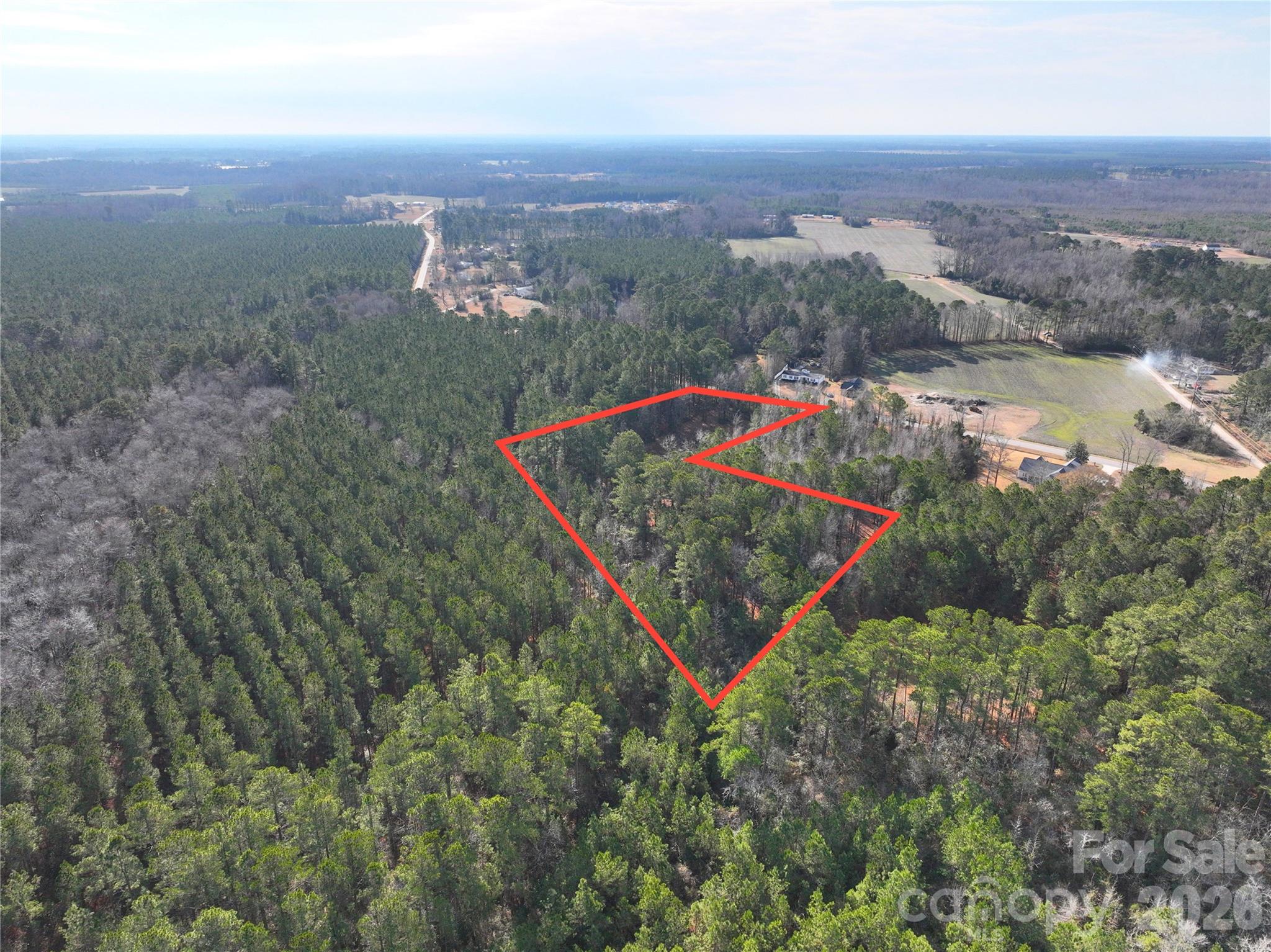 0 Mattocks Road Maysville, NC 28555 - Photo 19 of 25 an aerial view of residential houses with outdoor space and trees