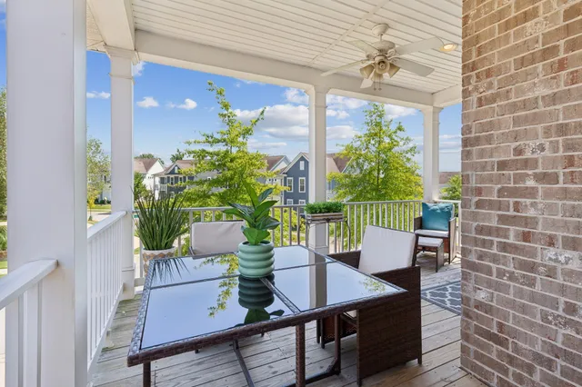 a outdoor living space with furniture and a potted plant