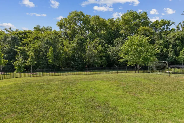 a view of outdoor space with deck and yard