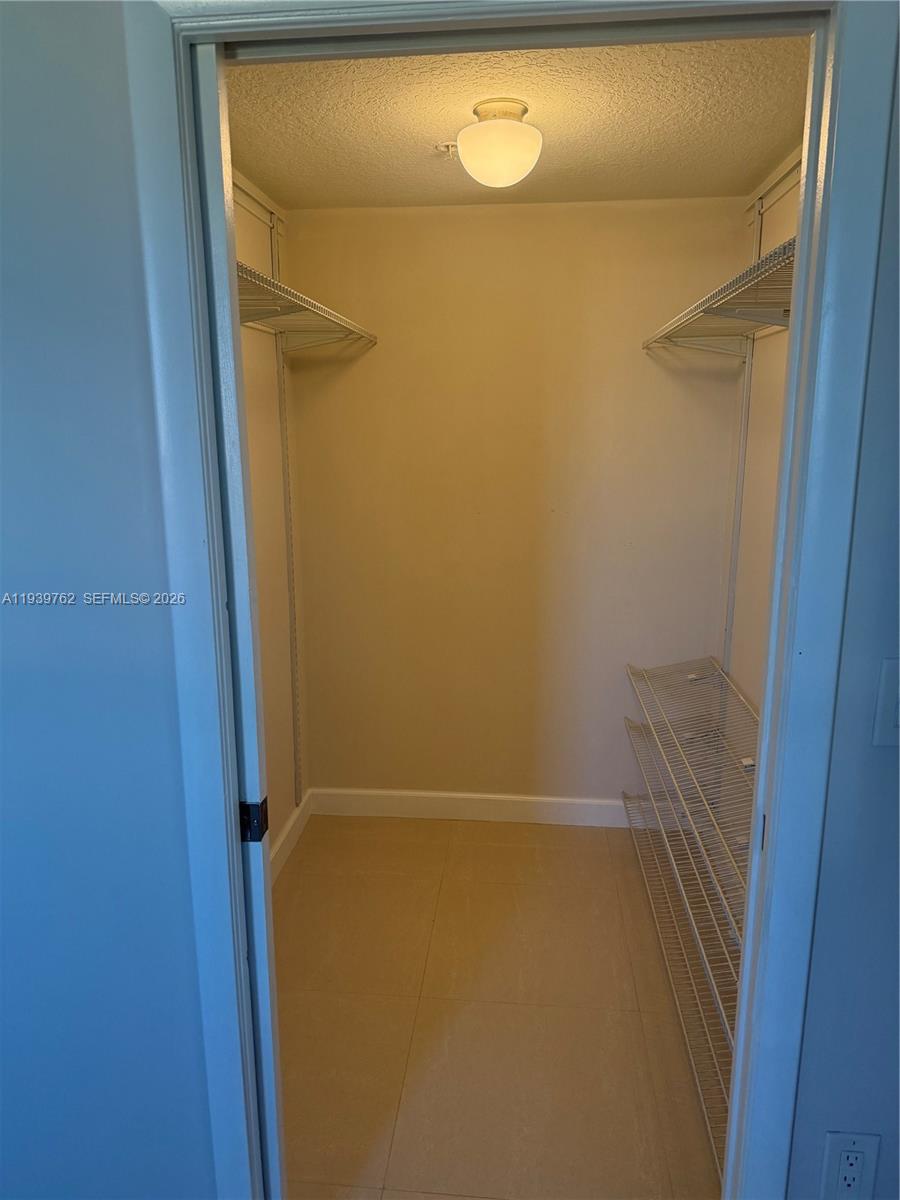 2630 Southwest 28th Street, Unit 47 Miami, FL 33133 - Photo 6 of 7 a bathroom with a shower