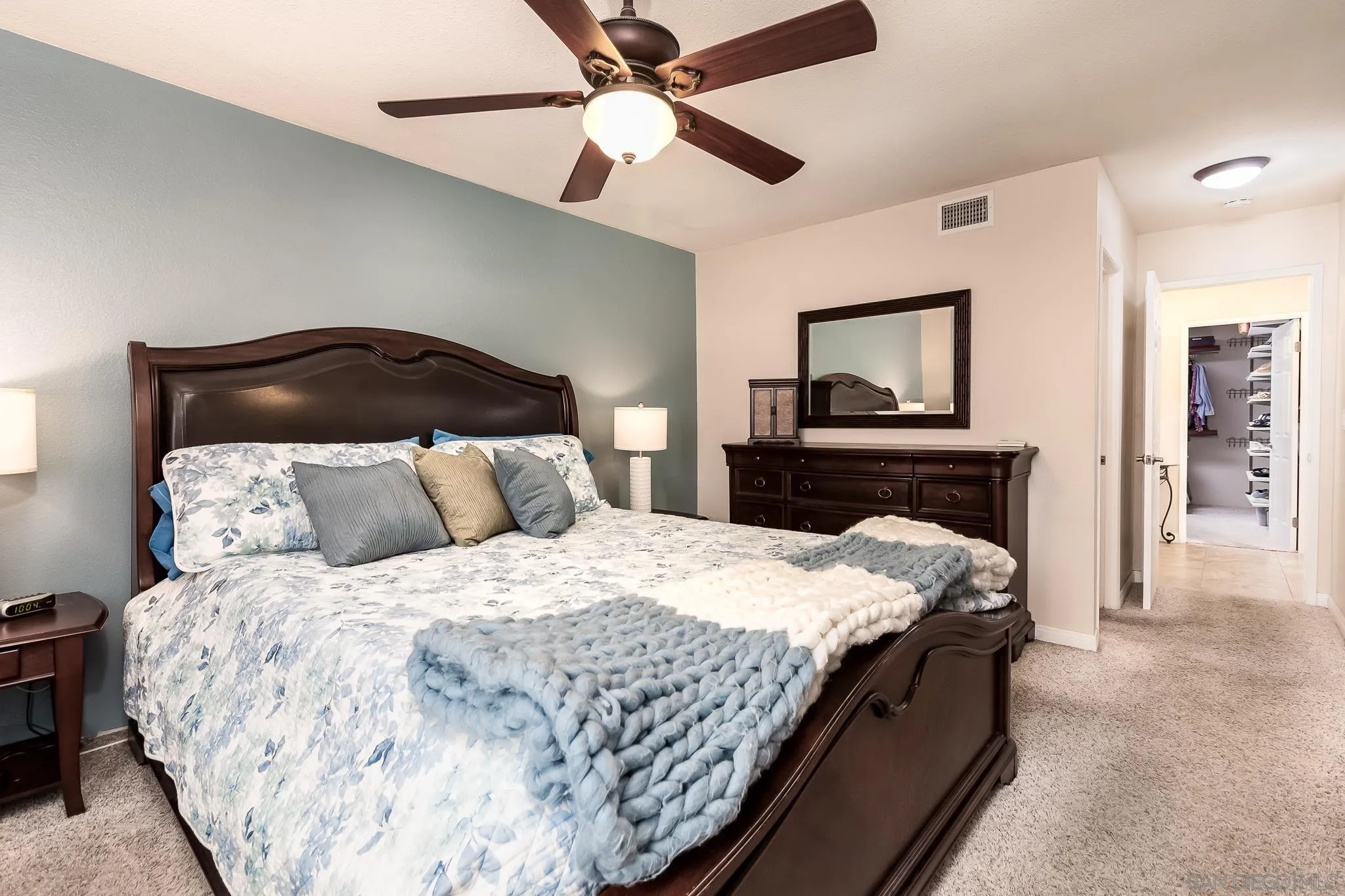 8537 Cordial Road El Cajon, CA 92021 - Photo 12 of 37 a bedroom with a bed and a ceiling fan