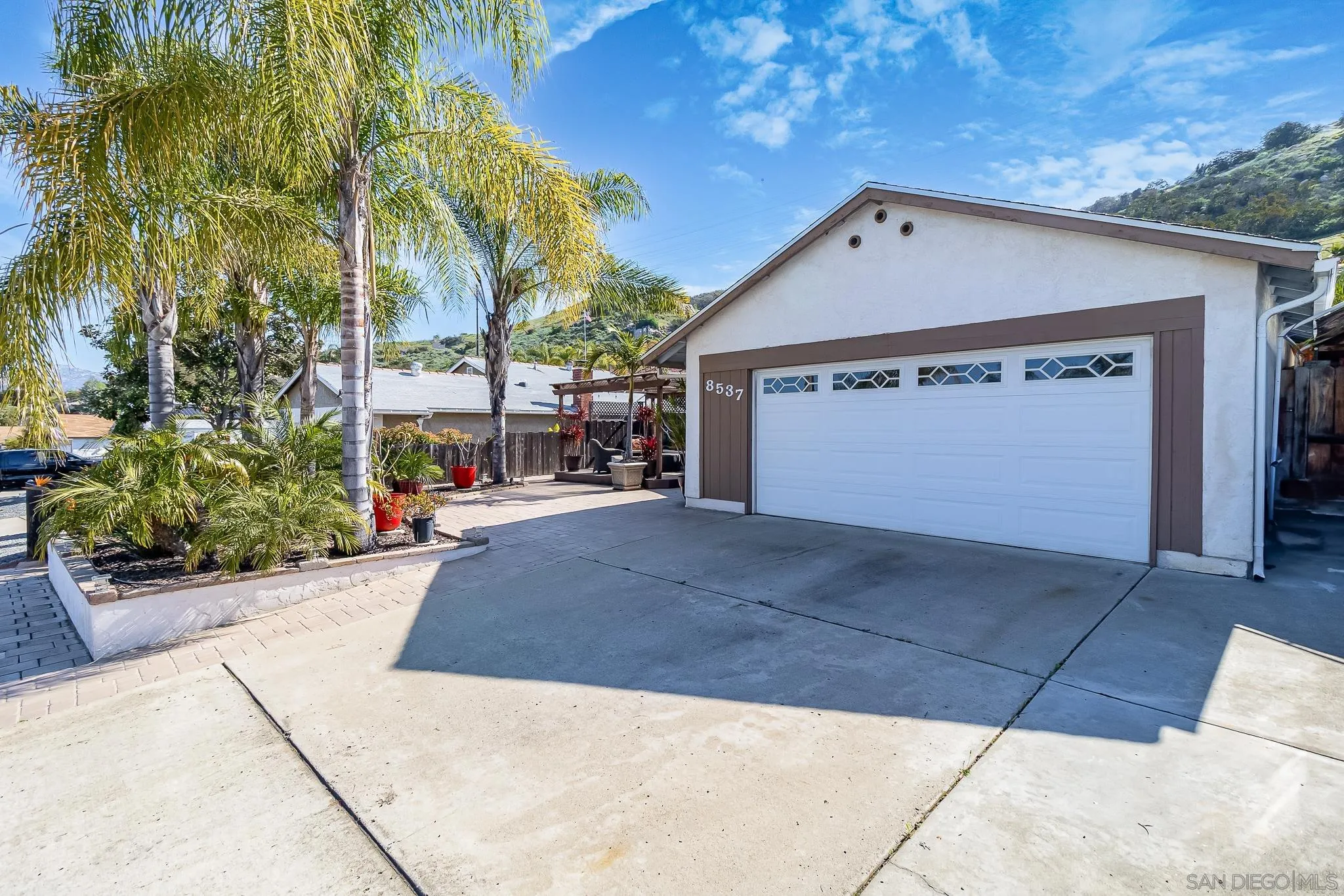 8537 Cordial Road El Cajon, CA 92021 - Photo 18 of 37 a view of a house with a yard