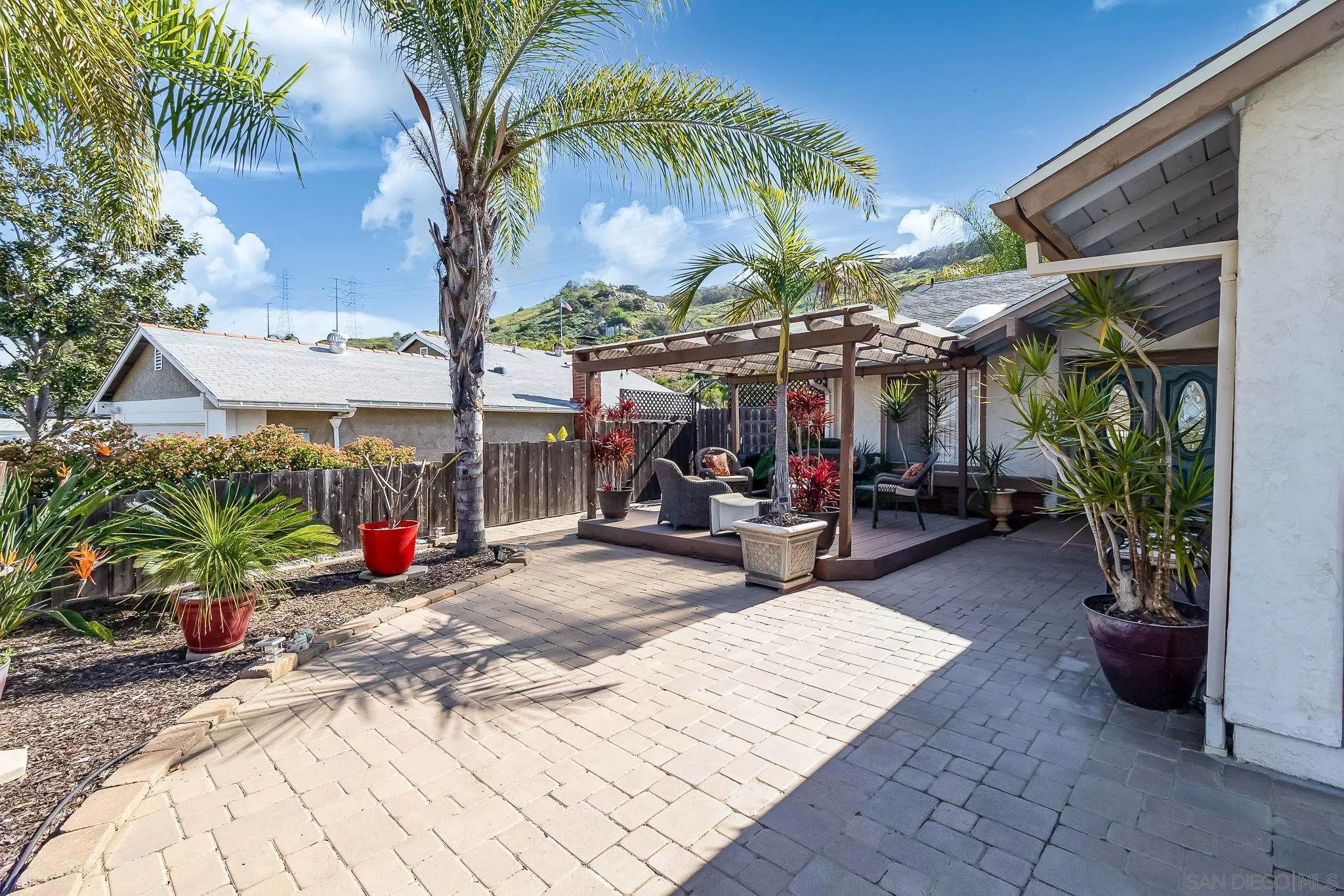8537 Cordial Road El Cajon, CA 92021 - Photo 21 of 37 a view of a chairs and table in a patio