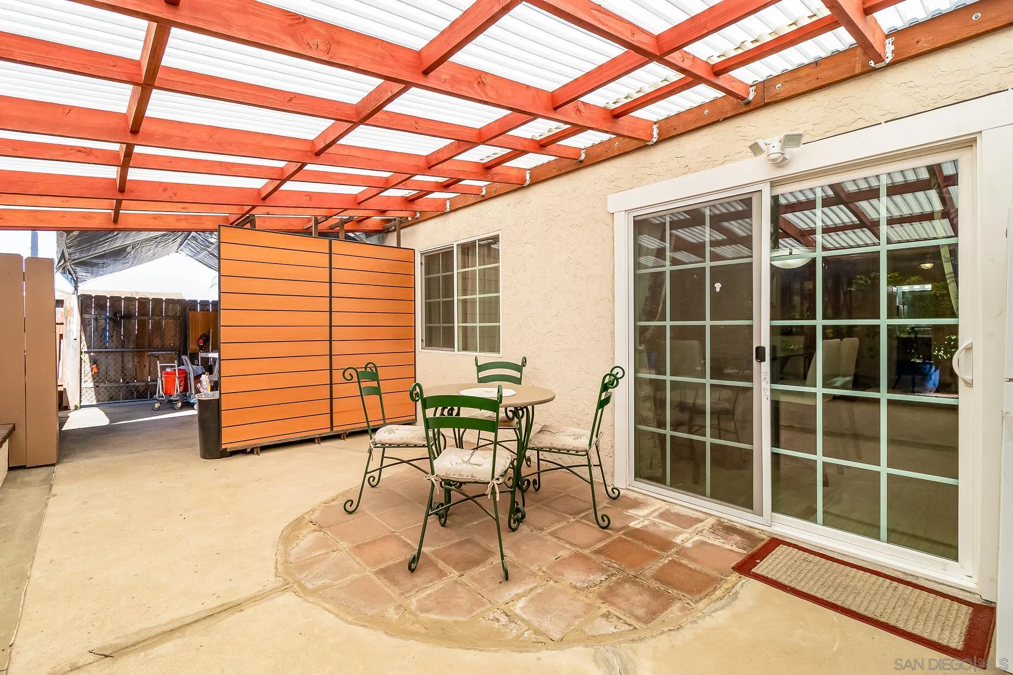 8537 Cordial Road El Cajon, CA 92021 - Photo 26 of 37 a view of a porch with a table and chairs