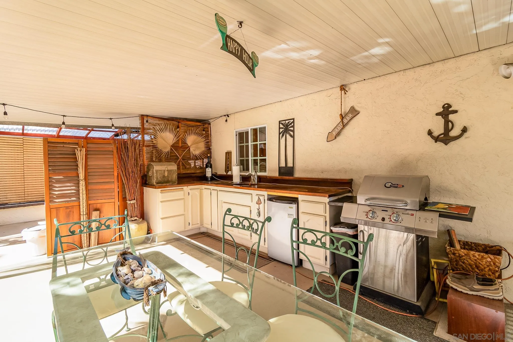 8537 Cordial Road El Cajon, CA 92021 - Photo 29 of 37 a kitchen with stainless steel appliances kitchen island granite countertop a stove and white cabinets